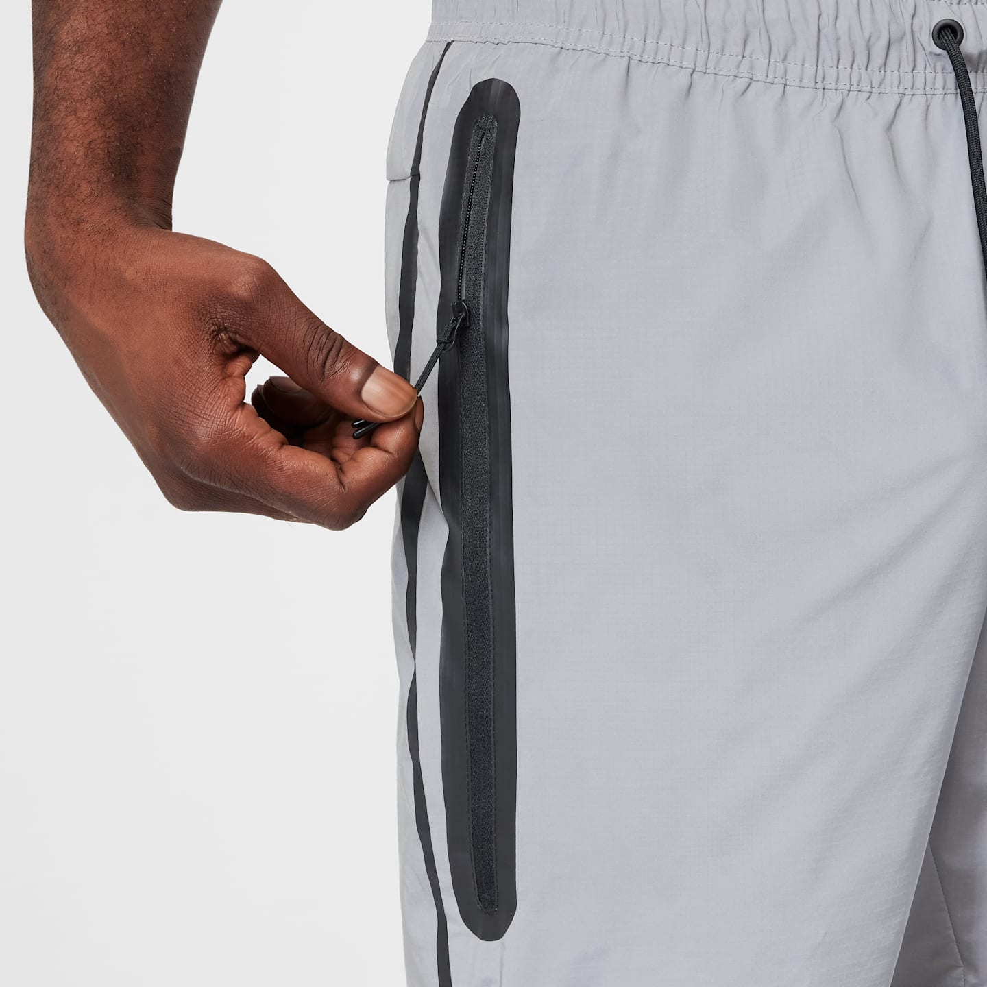 Мужские брюки Nike Tech Men's Woven Reflective Pants — фото 6