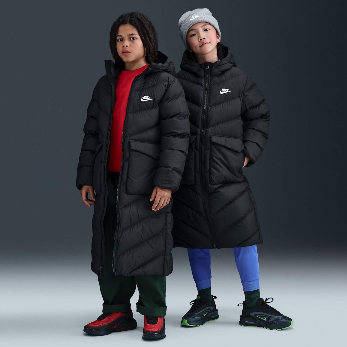 Детские куртки Nike Sportswear All Day Play Big Kids' Therma-FIT Loose-Fit Full-Length Puffer Parka — фото 1