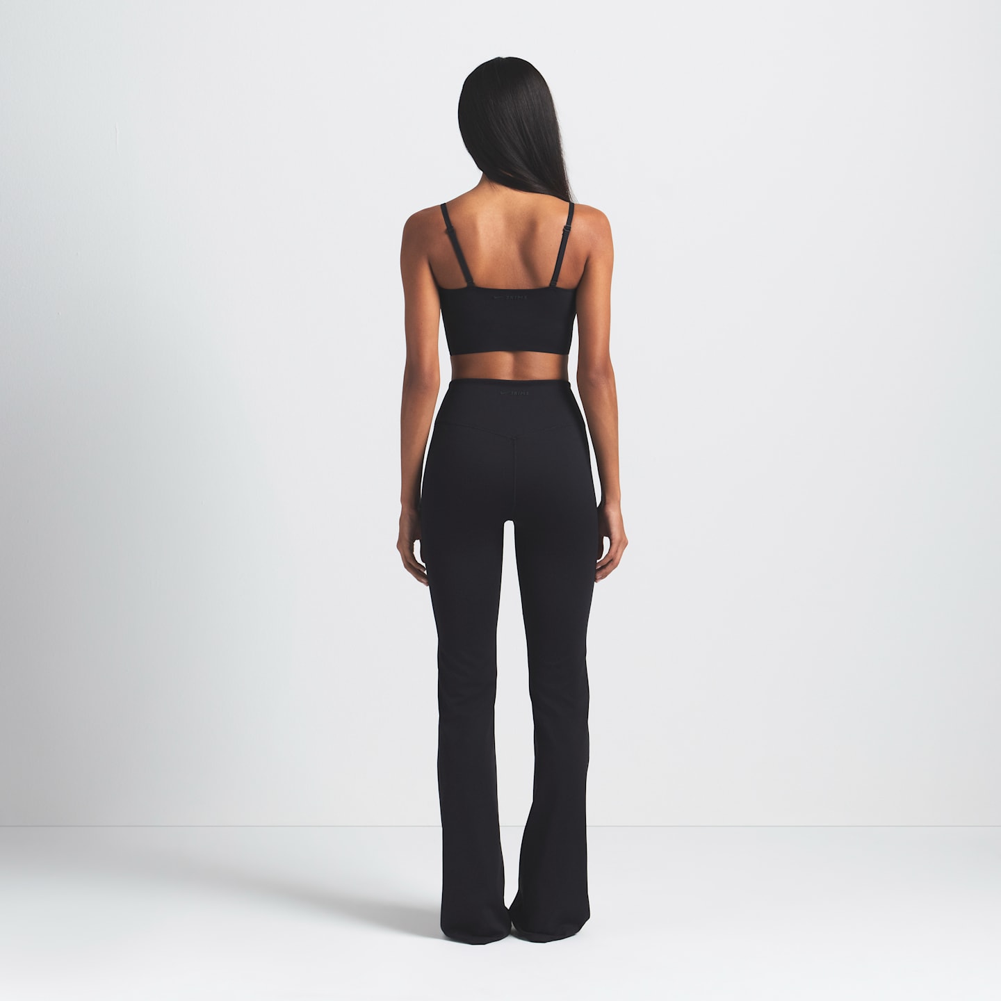 Женские леггинсы Nike NikeSKIMS Matte Women's High-Waisted Slim Flared Leggings — фото 6