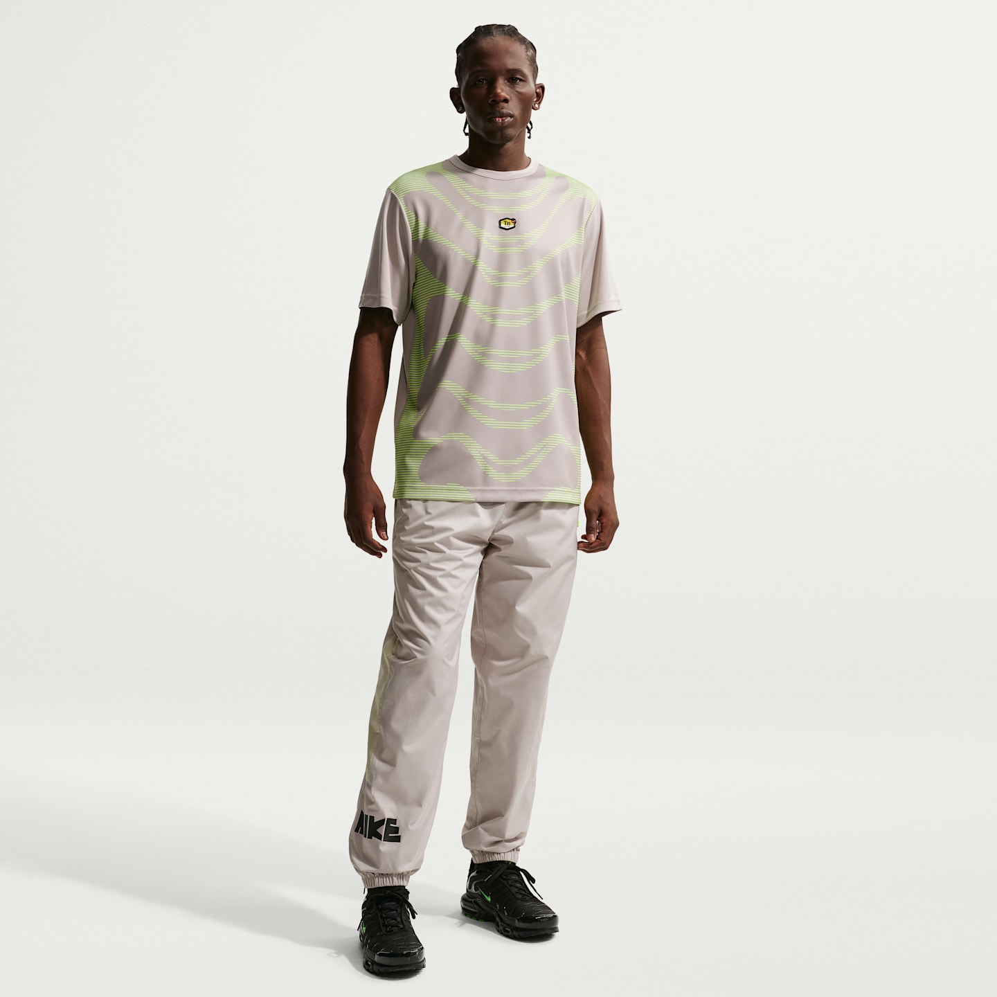 Мужские брюки Nike Windrunner Men's Woven Graphic Pants — фото 1