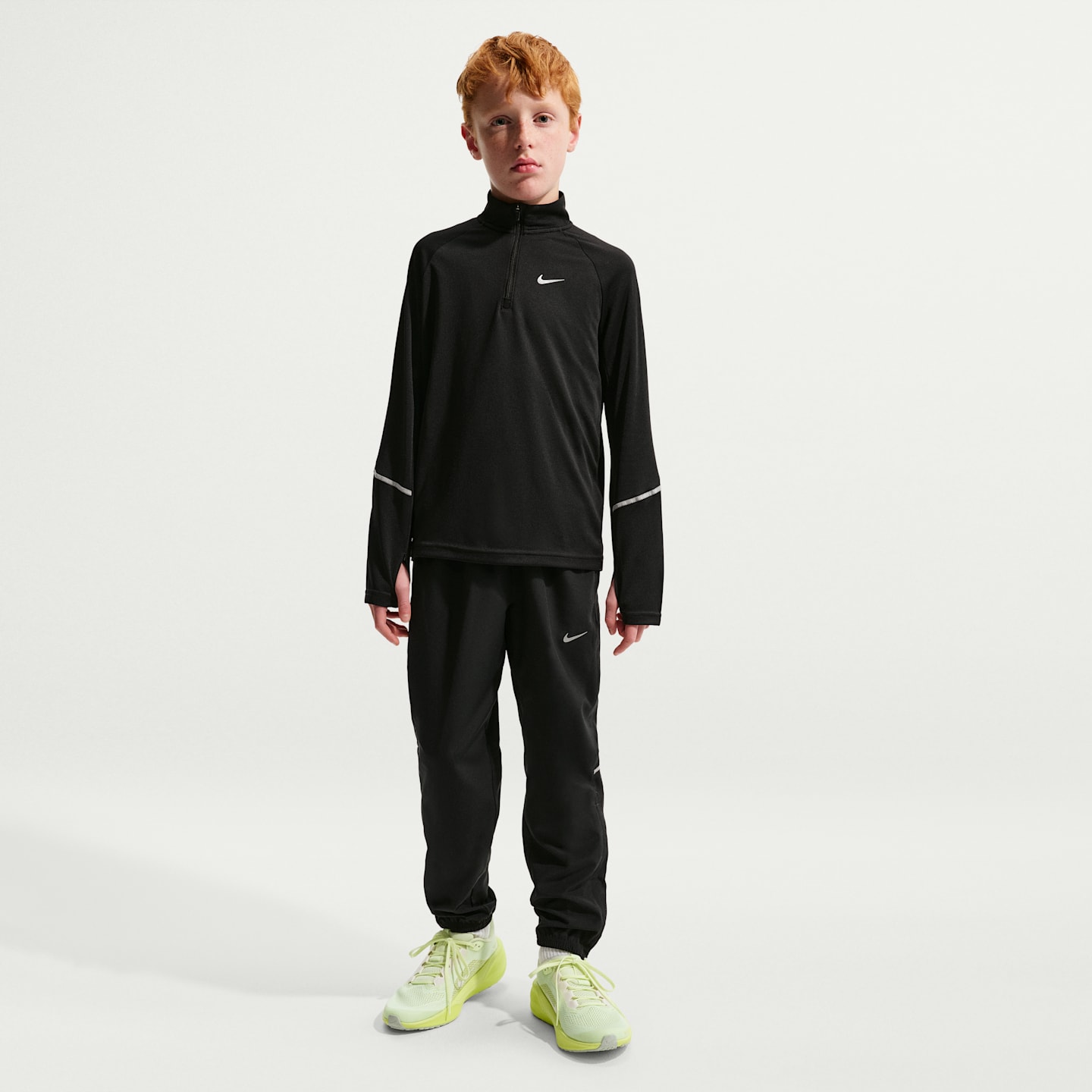 Детские брюки Nike Miler Big Kids' Dri-FIT Woven Pants — фото 1