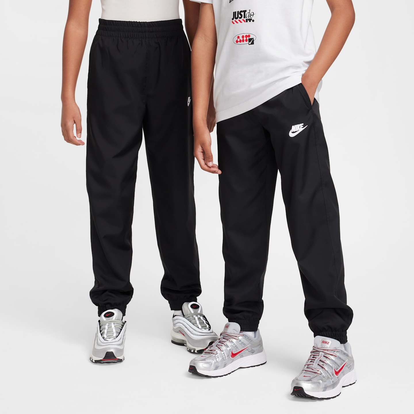 Детские брюки Nike Sportswear Club Big Kids' Woven Joggers — фото 1