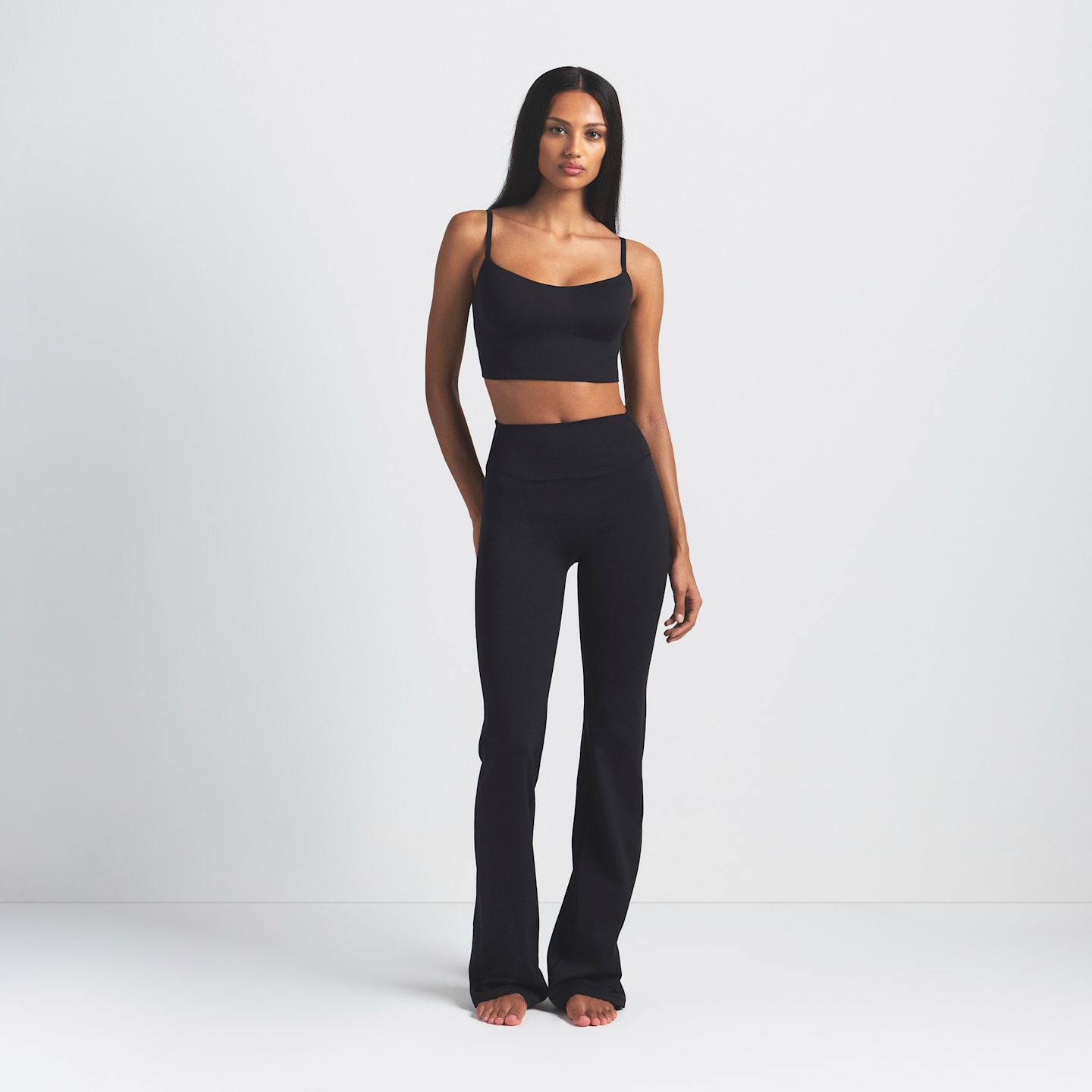 Женские леггинсы Nike NikeSKIMS Matte Women's High-Waisted Slim Flared Leggings — фото 1