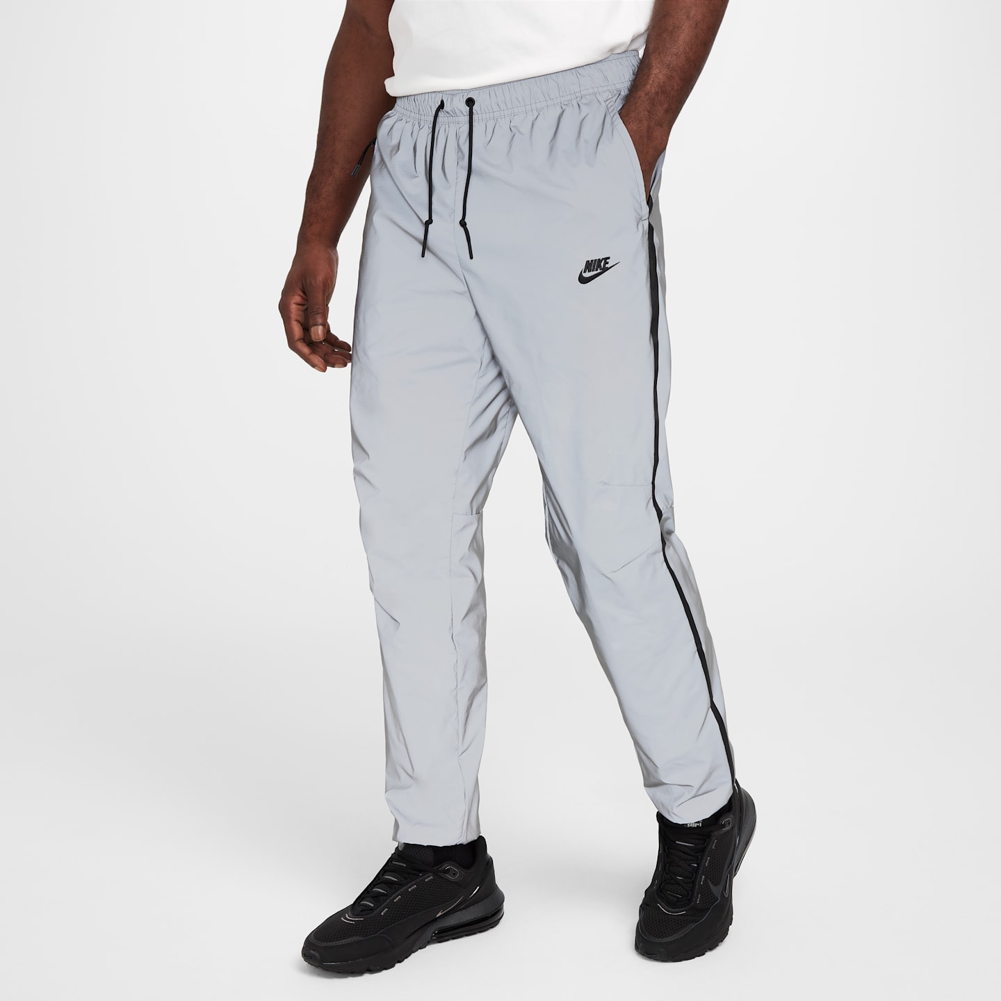 Мужские брюки Nike Tech Men's Woven Reflective Pants — фото 1