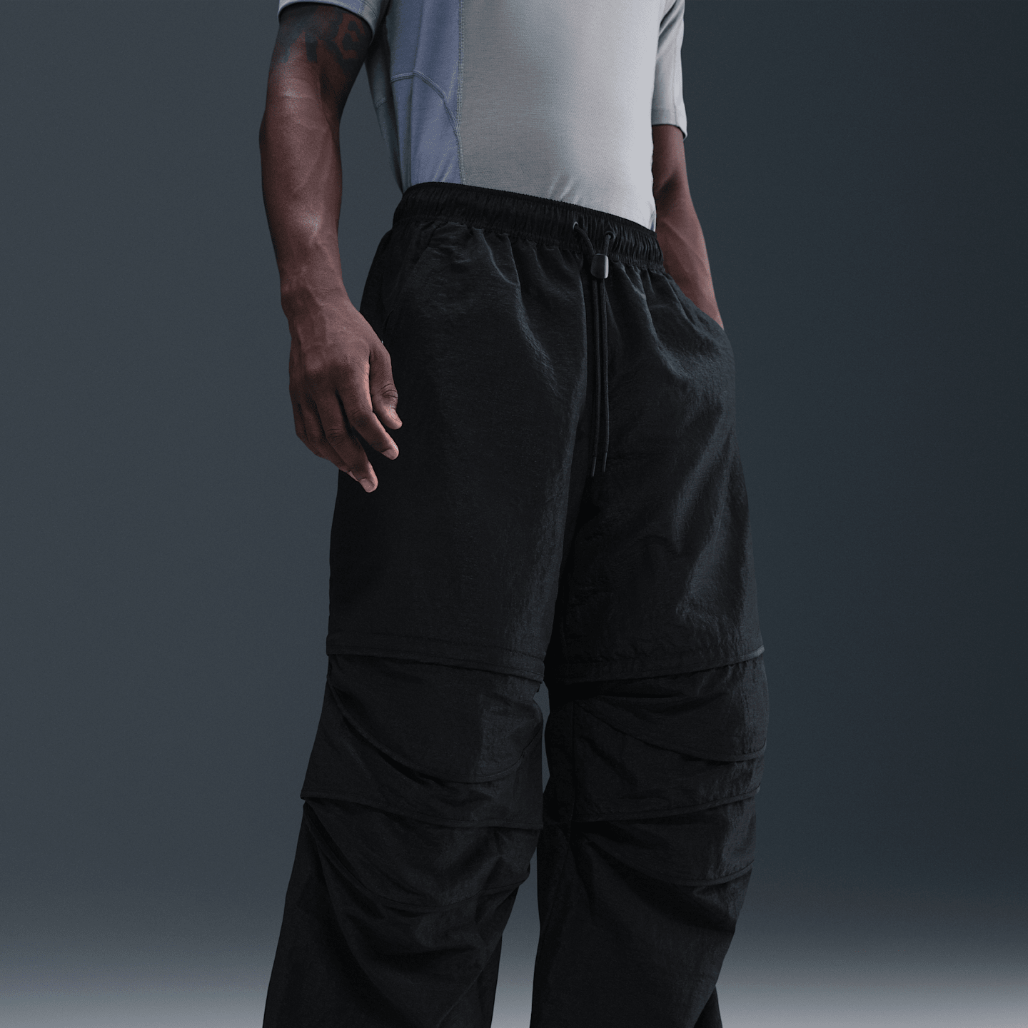 Мужские брюки Nike Tech Men's Woven Convertible Oversized Pants — фото 2