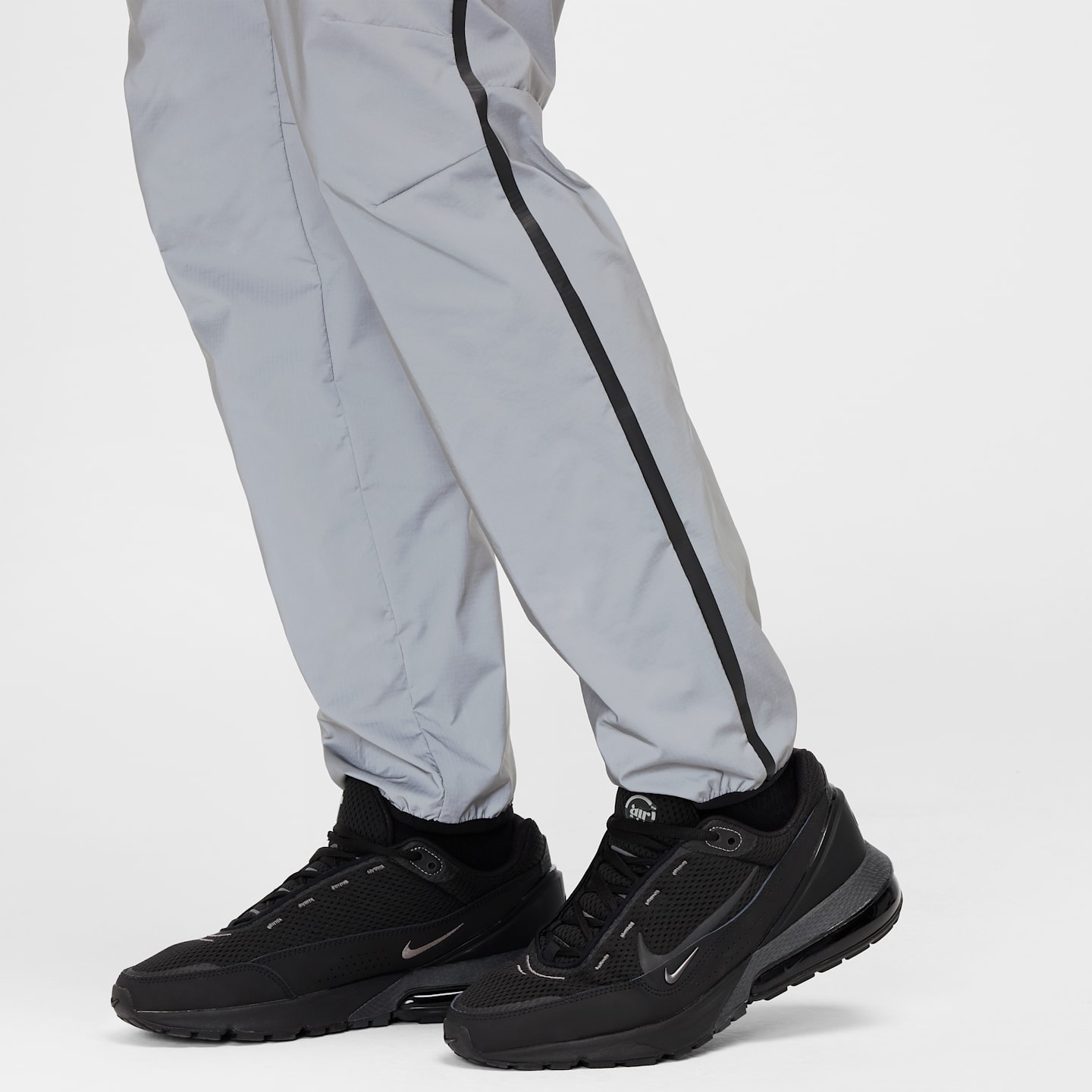Мужские брюки Nike Tech Men's Woven Reflective Pants — фото 7