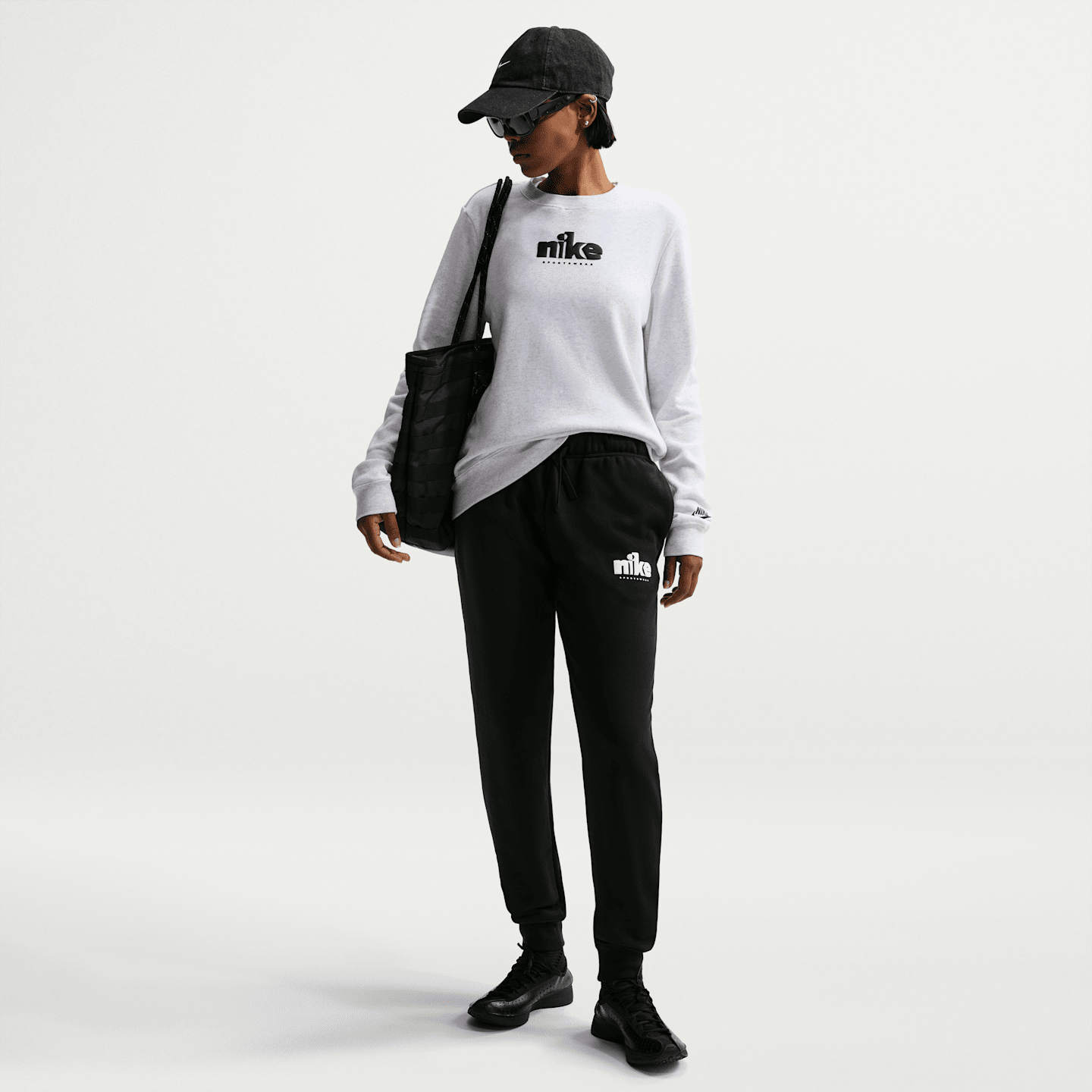 Женские брюки Nike Sportswear Club Fleece Women's Graphic Mid-Rise Pants — фото 1