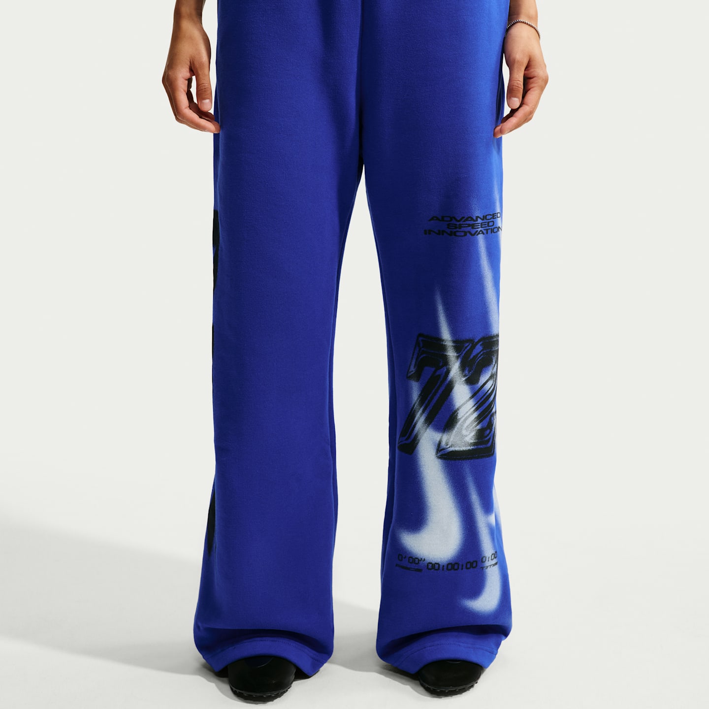 Женские брюки Nike Studio Fleece Medium Weight Women's Oversized High-Rise Straight-Leg Graphic Pants — фото 2