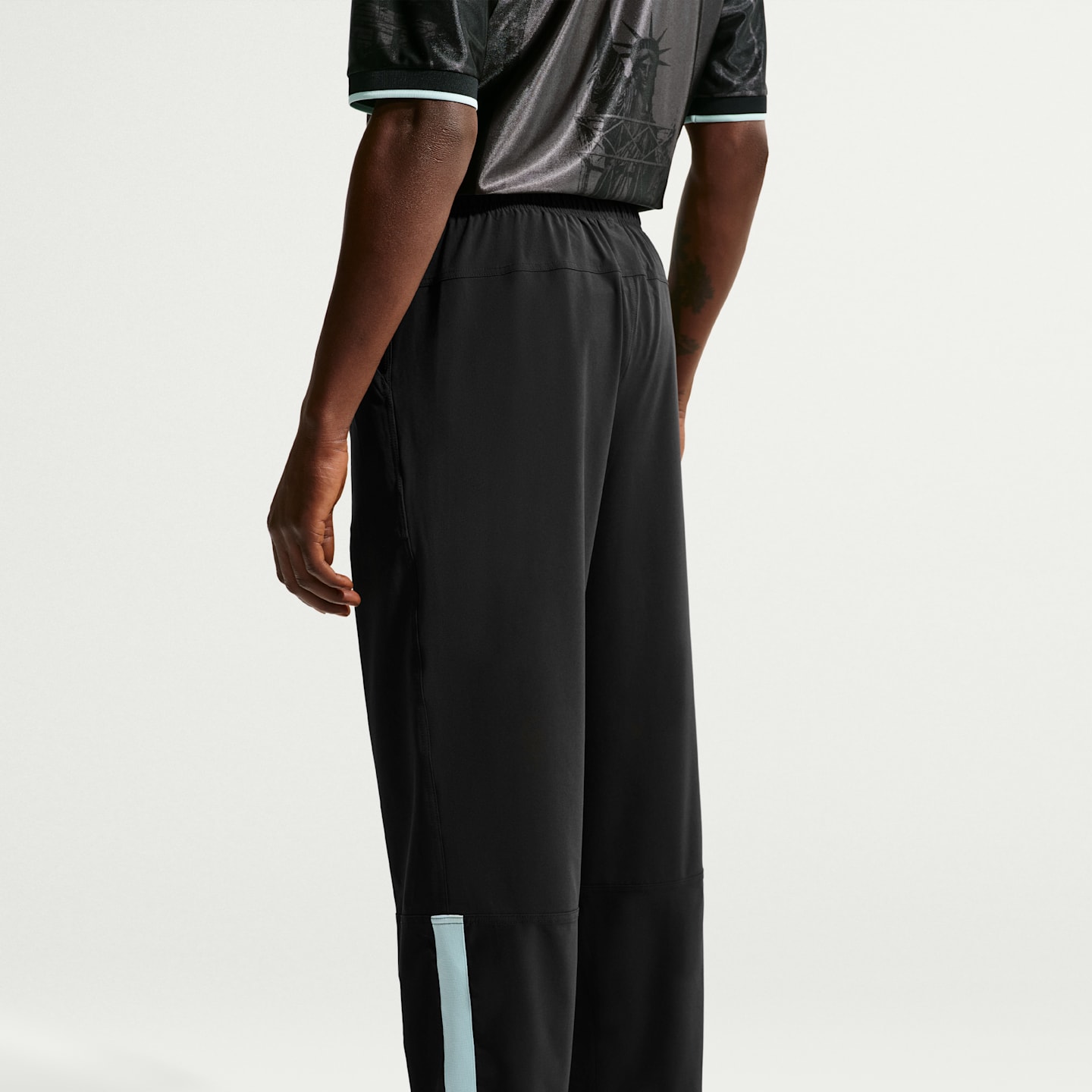 Мужские брюки Nike FFF Energy Men's Nike Dri-FIT Soccer Woven Pants — фото 3