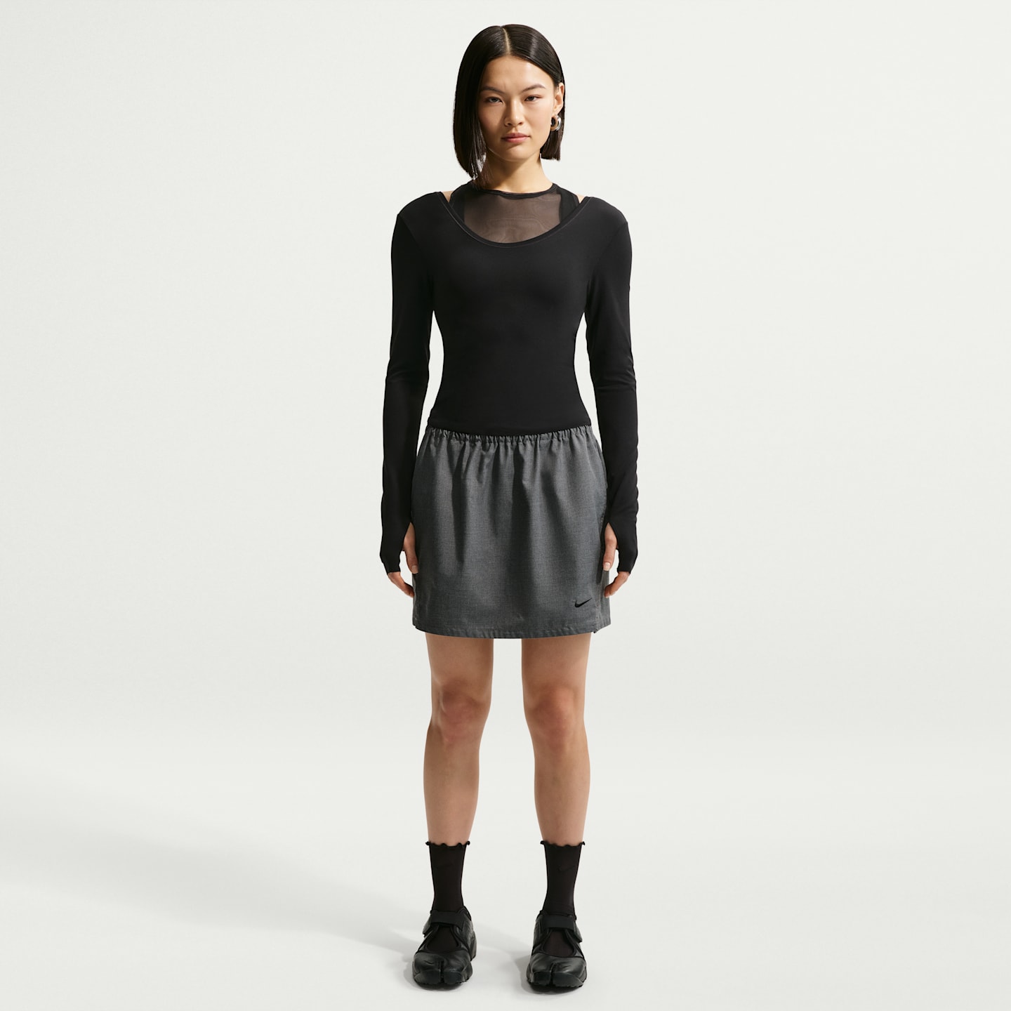 Женские юбки Nike Sportswear Women's Loose Woven Skirt — фото 1