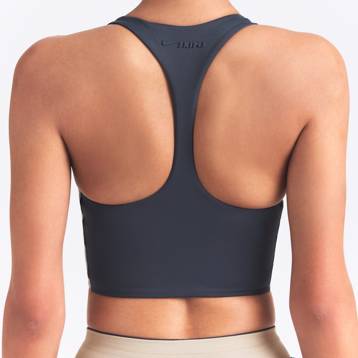 Женские спортивные бра Nike NikeSKIMS Matte Shine Mix Women's T-Back Bra — фото 2