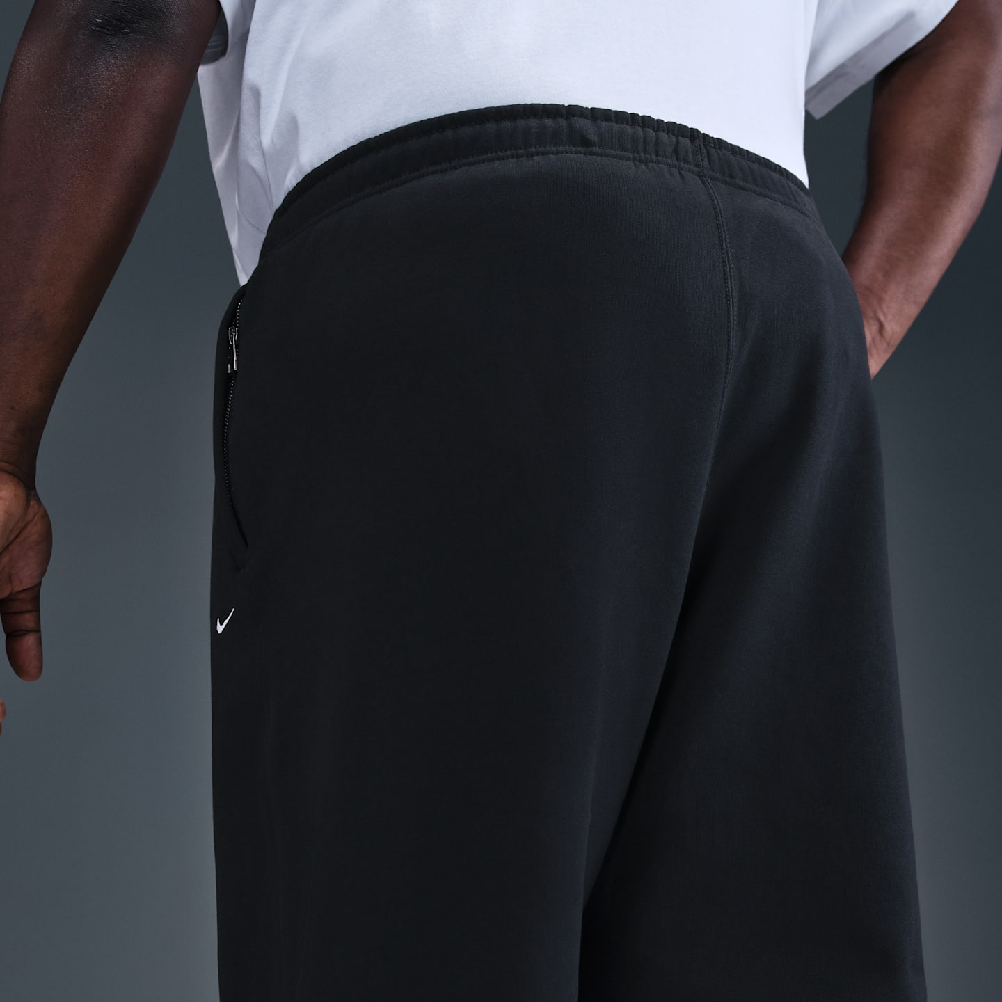 Мужские брюки Nike Solo Swoosh Men's Cuffed Fleece Pants — фото 8