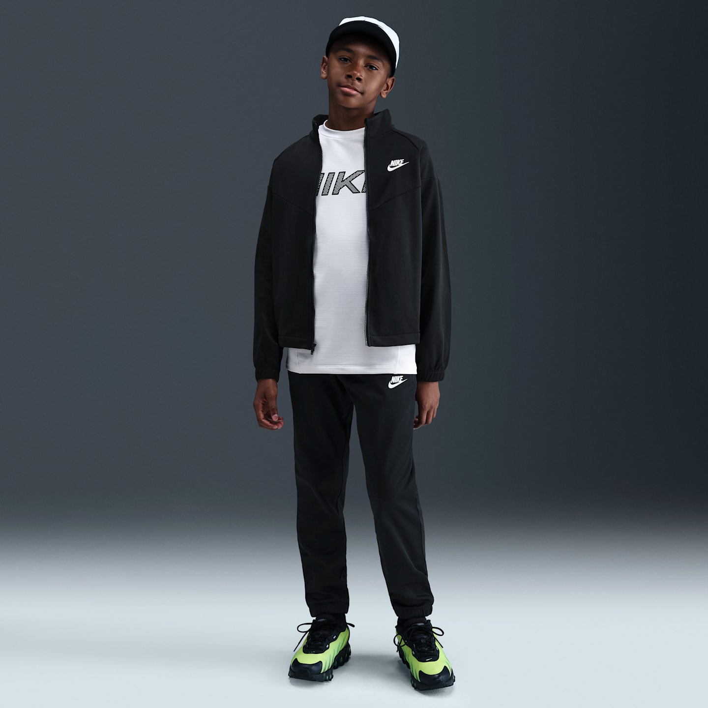 Детские кроссовки Nike Sportswear Big Kids' Dri-FIT Tracksuit — фото 6