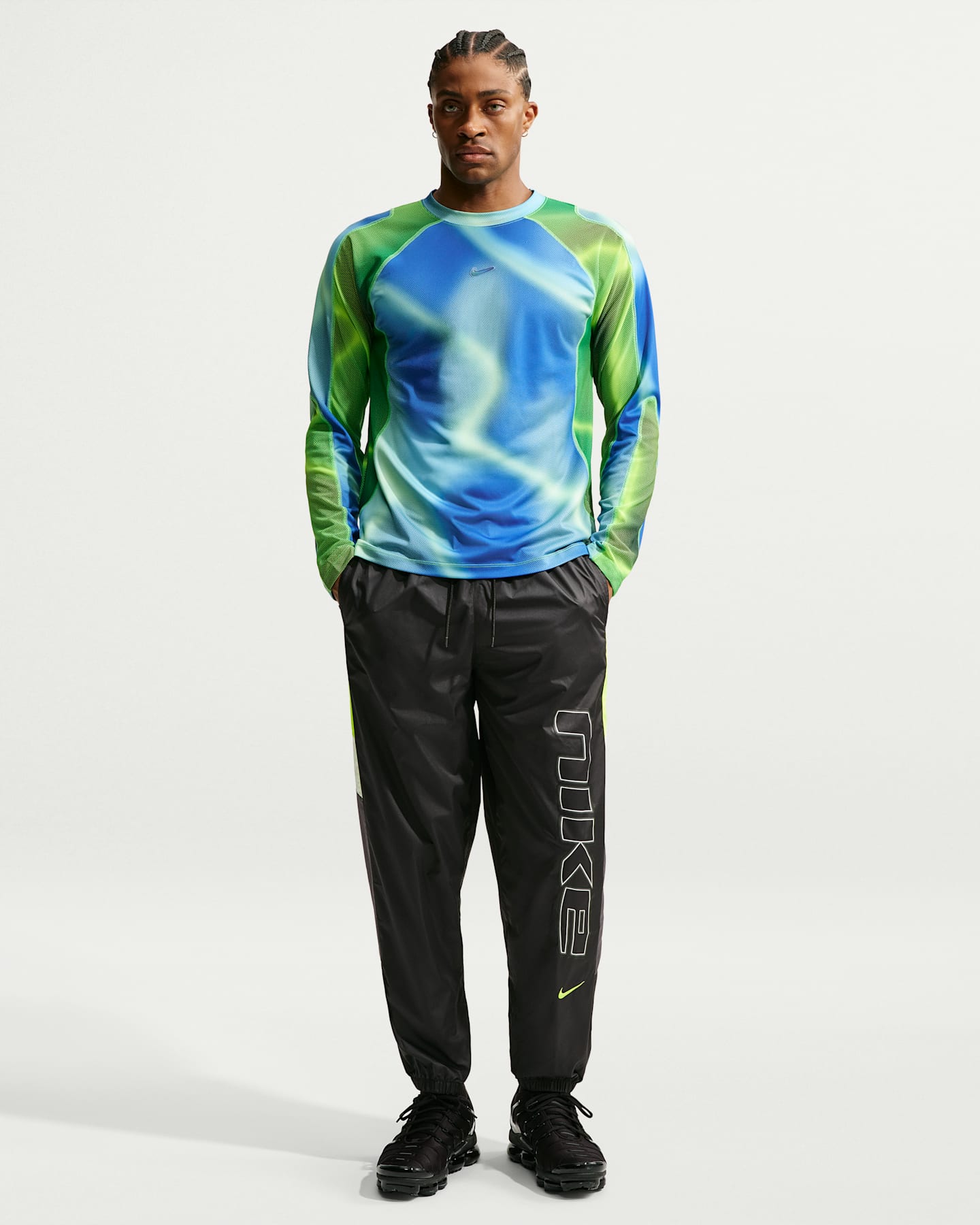 Мужские брюки Nike Sportswear Windrunner Men's Lined Pants — фото 6