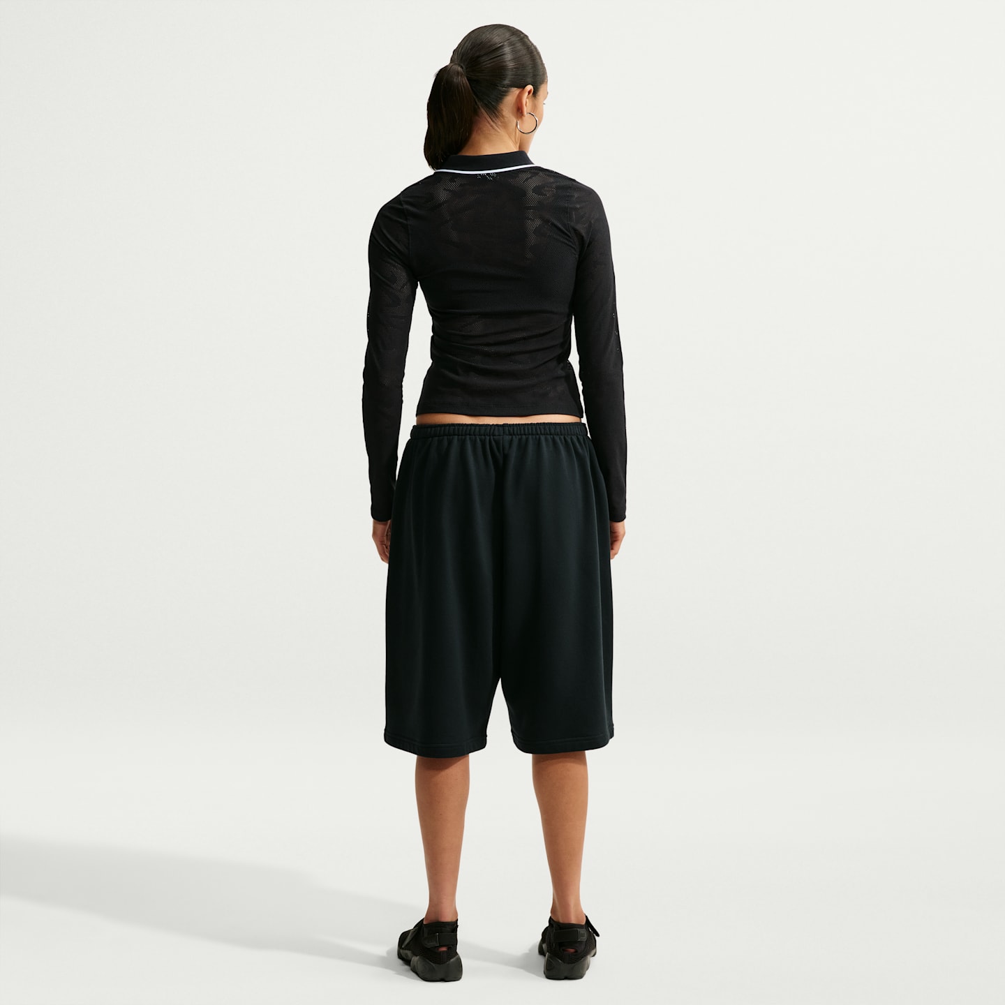 Женские брюки Nike Sportswear Chill Knit Women's Tight Mod-Cropped Long-Sleeve Lace Top — фото 5