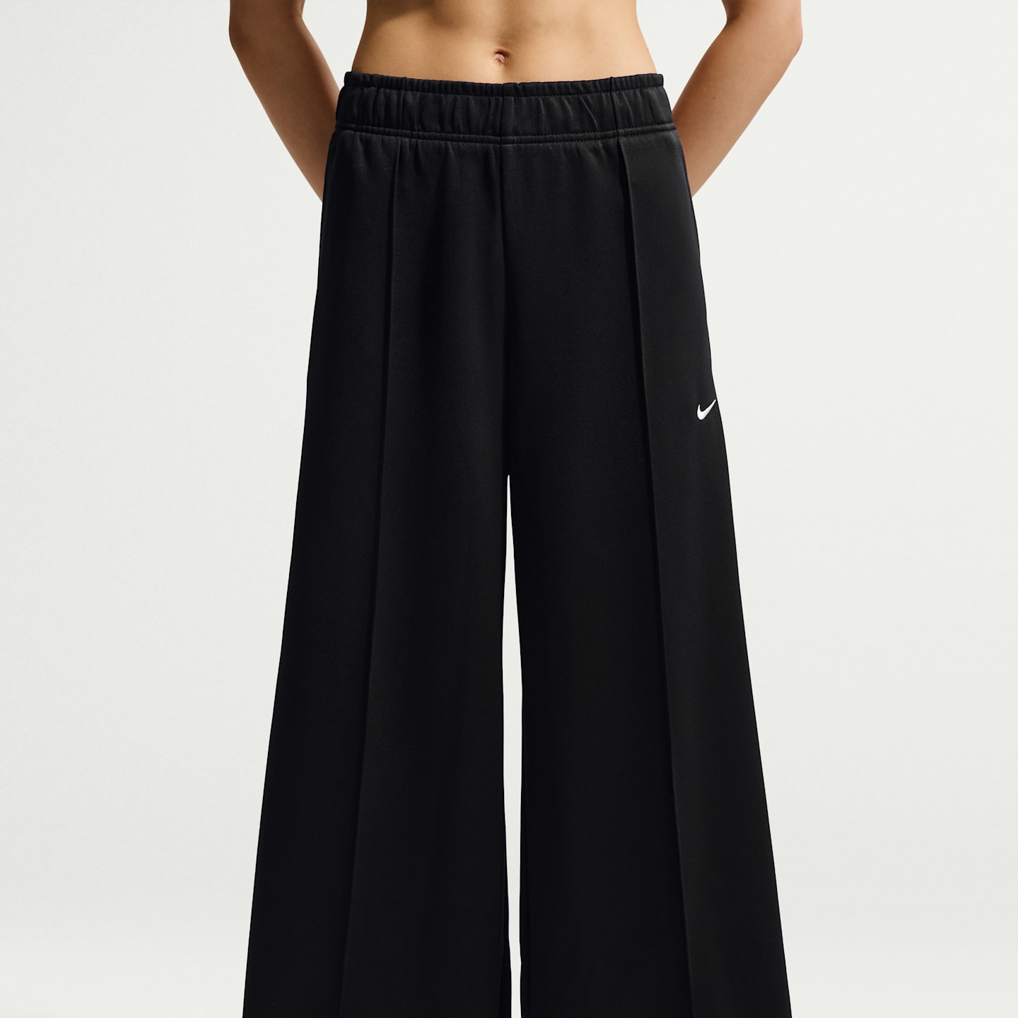 Женские брюки Nike Sportswear Women's Mid-Rise Wide-Leg Track Pants — фото 2