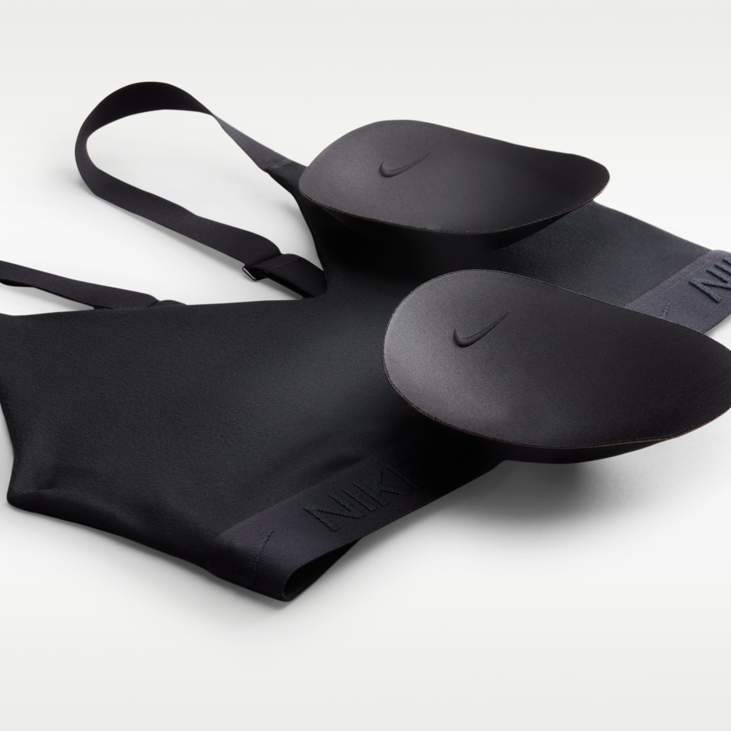 Спортивное бра Indy Medium Adjustable, уплотнённая чашка — Nike — фото 4
