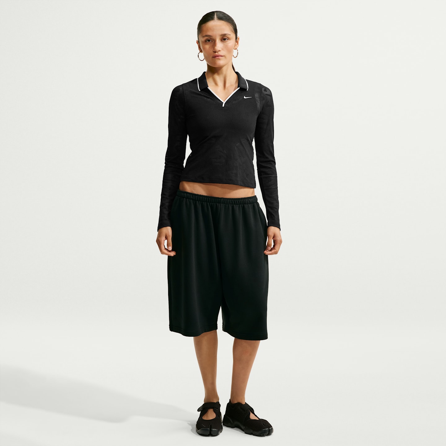 Женские брюки Nike Sportswear Chill Knit Women's Tight Mod-Cropped Long-Sleeve Lace Top — фото 4