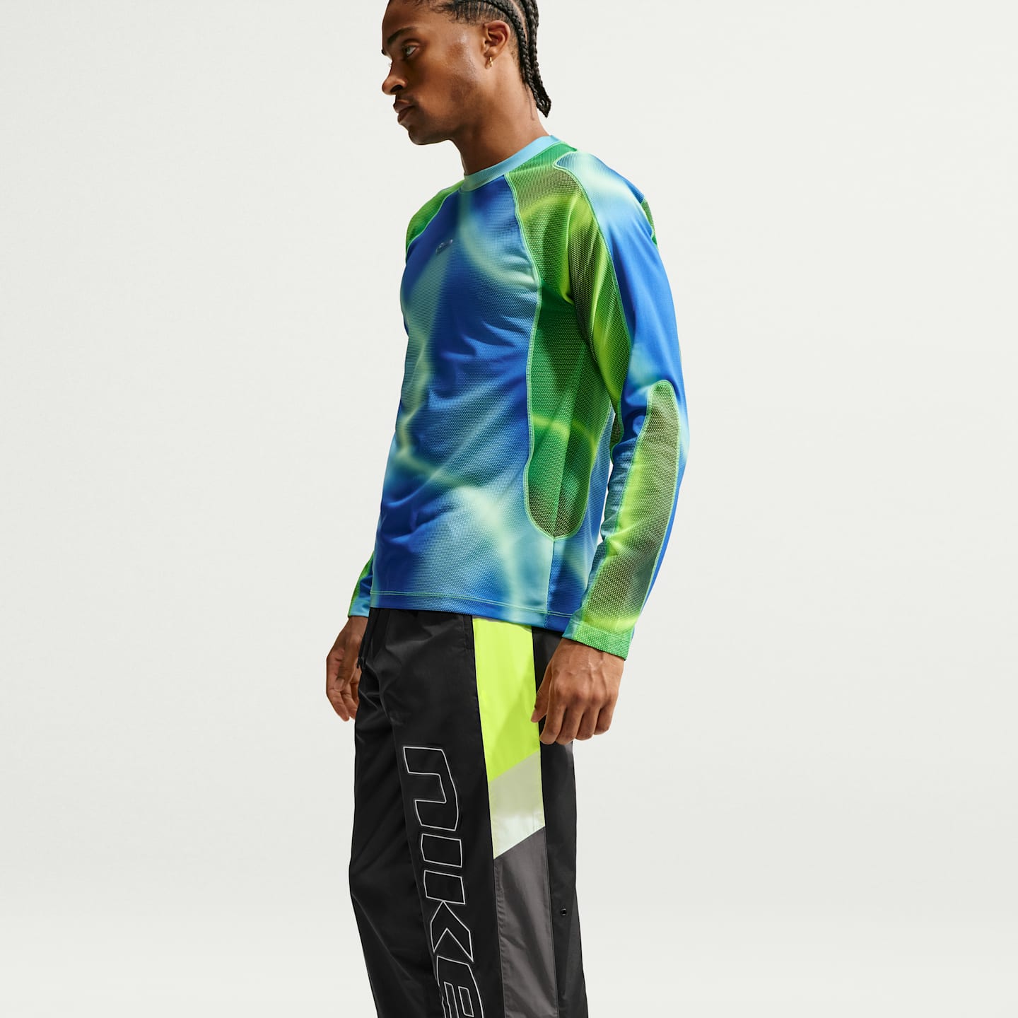 Мужские брюки Nike Sportswear Windrunner Men's Lined Pants — фото 4