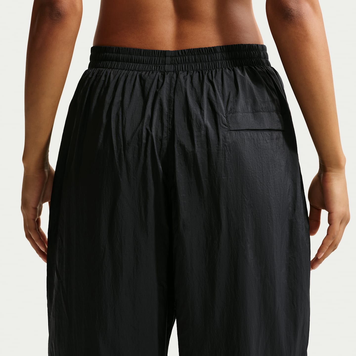 Женские брюки Nike Sportswear Women's Mid-Rise Lightweight UV Pants — фото 3