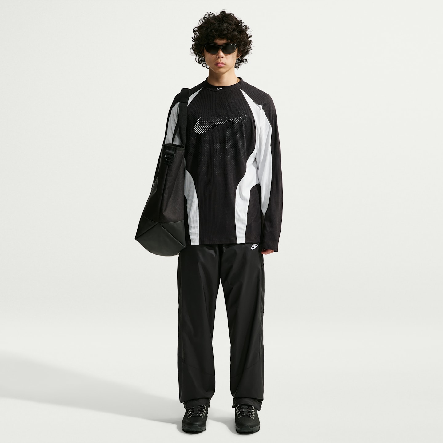 Мужские брюки Nike Windrunner Men's Lightweight Pants — фото 1