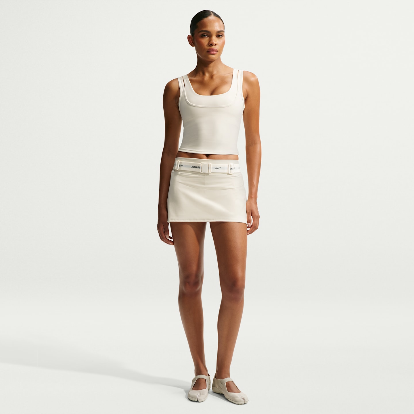Женские юбки Nike NikeSKIMS Matte Women's Skort — фото 1