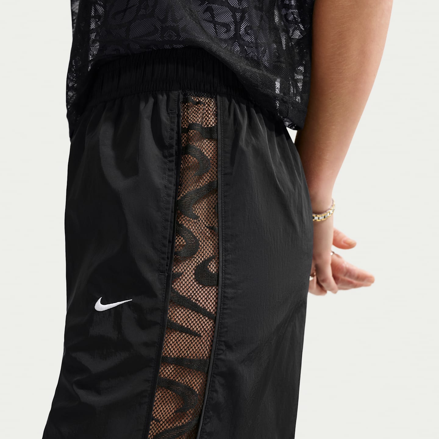Женские брюки Nike Sportswear Women's Loose Mid-Rise Lace Track Pants — фото 2