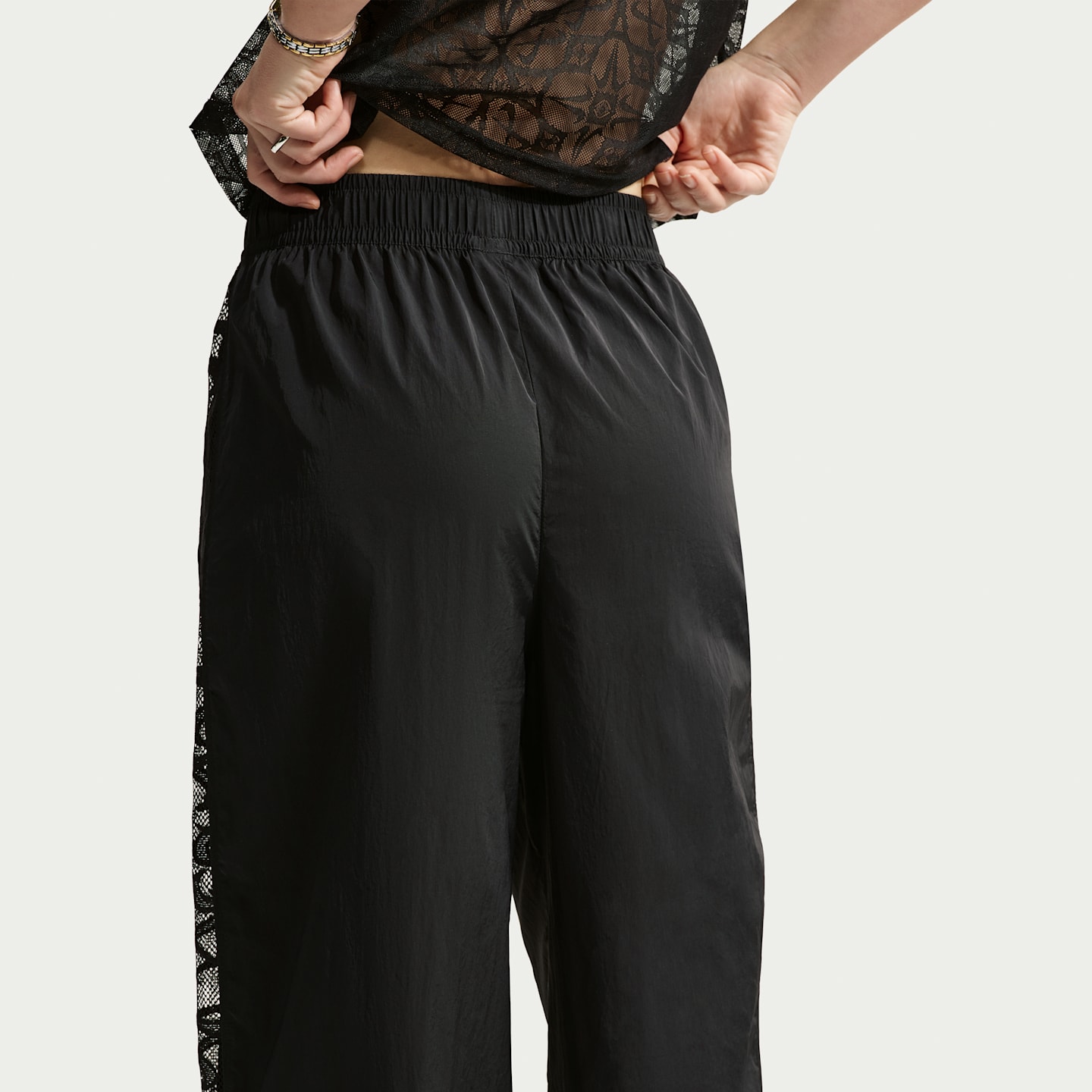 Женские брюки Nike Sportswear Women's Loose Mid-Rise Lace Track Pants — фото 3