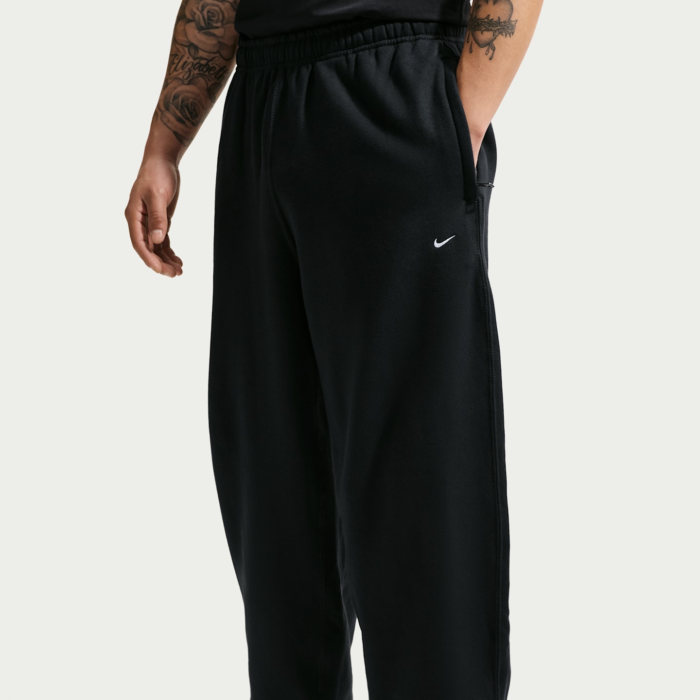 Мужские брюки Nike Solo Swoosh Men's Cuffed Fleece Pants — фото 2