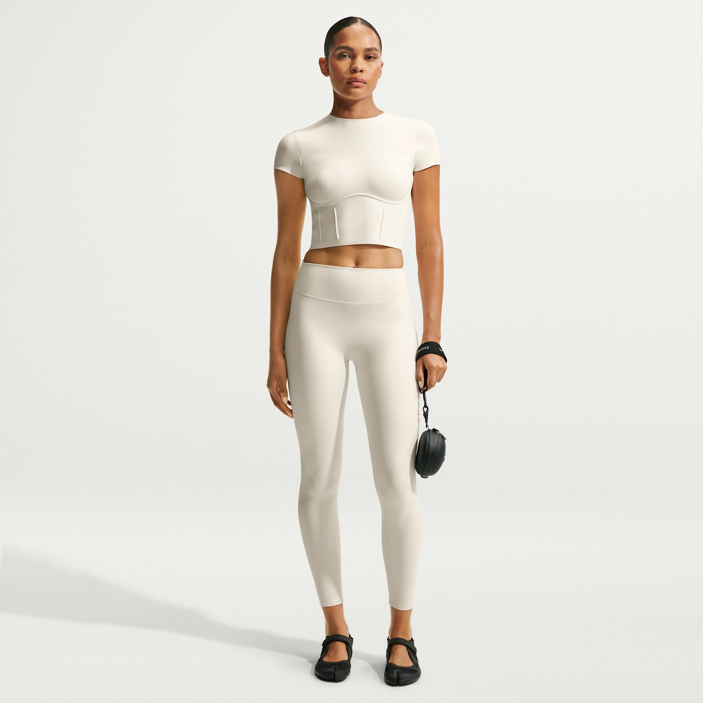 Женские леггинсы Nike NikeSKIMS Matte Women's High-Waisted 26" Leggings — фото 1