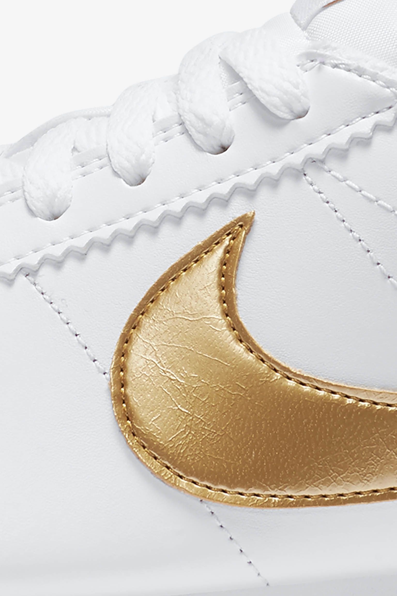 nike cortez womens white and gold