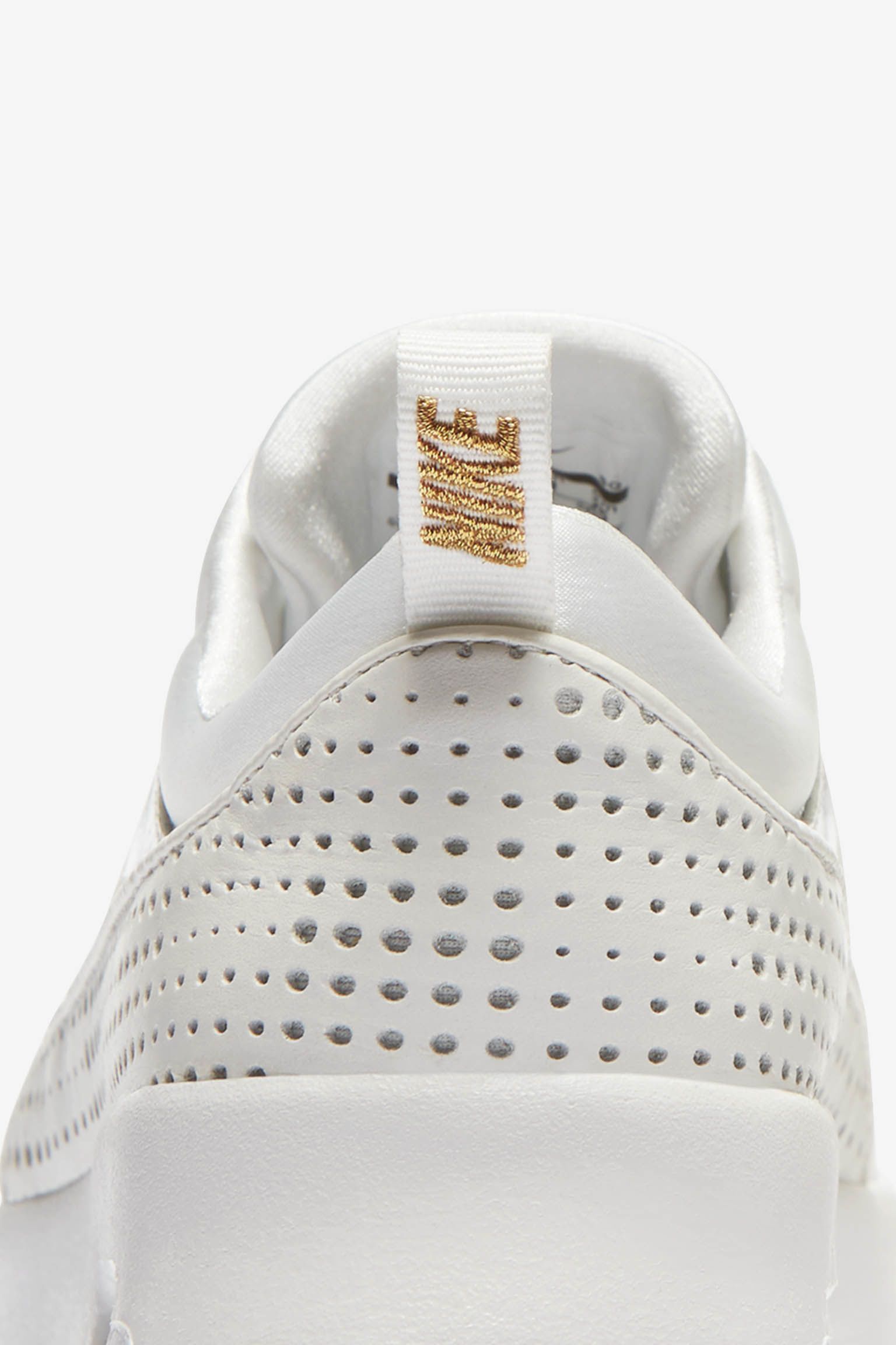 white & gold air max thea trainers