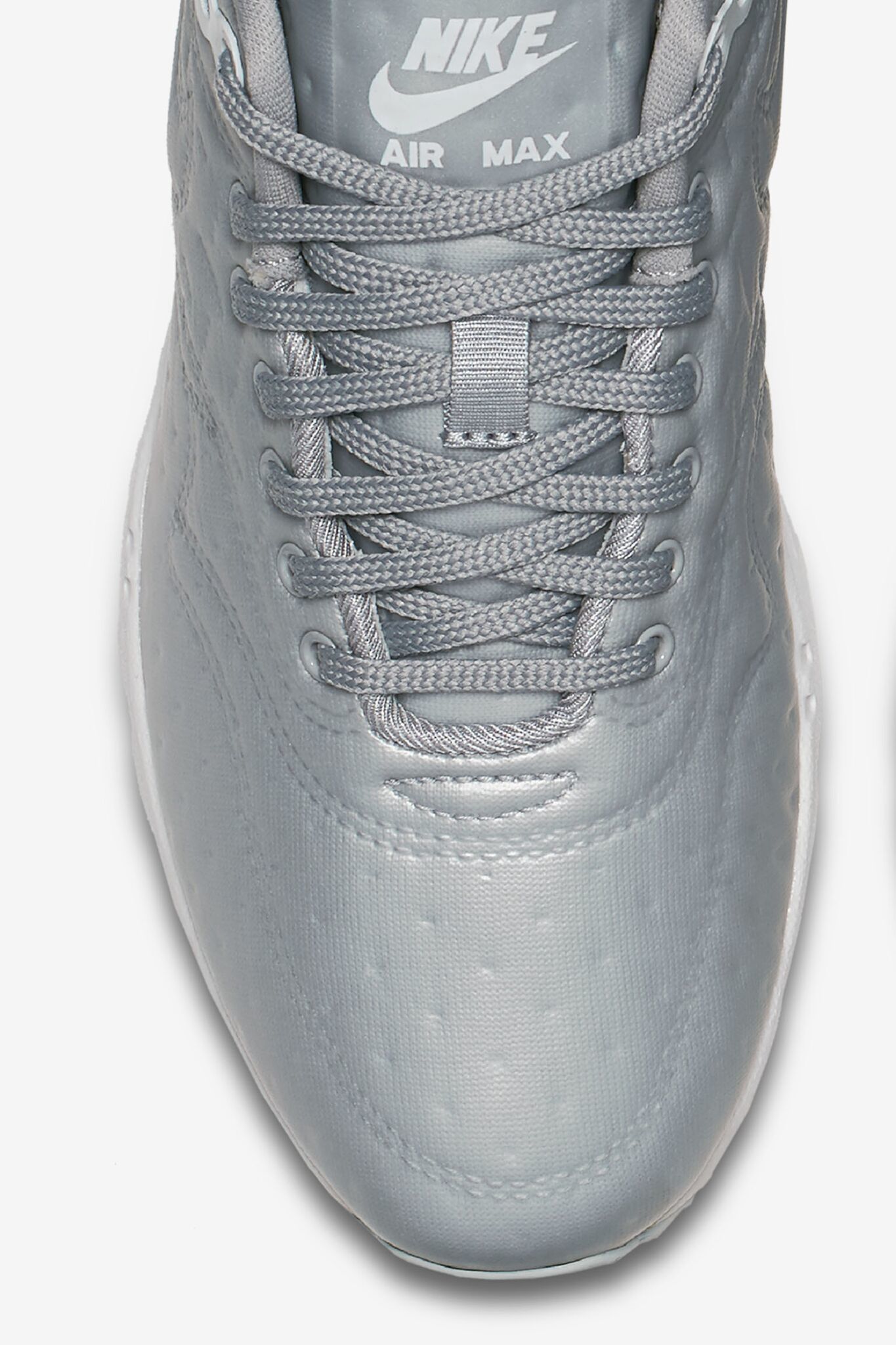 silver nike shoes
