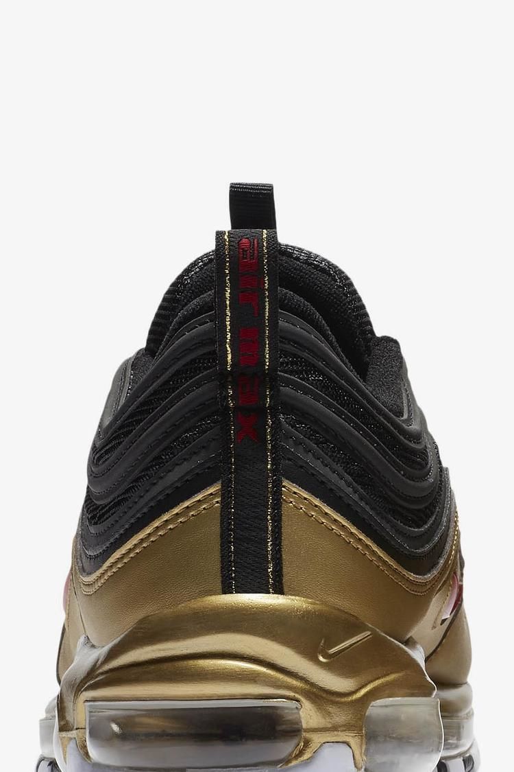 black and gold nike 97