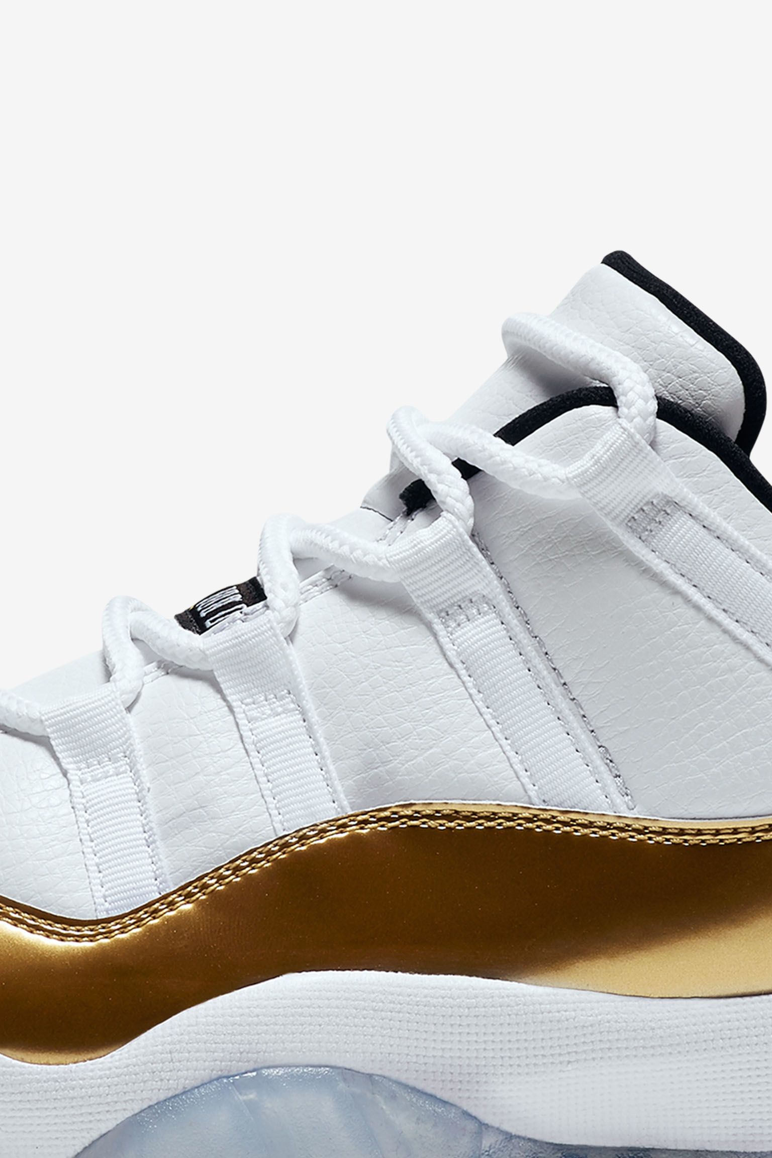 white jordans with gold trim