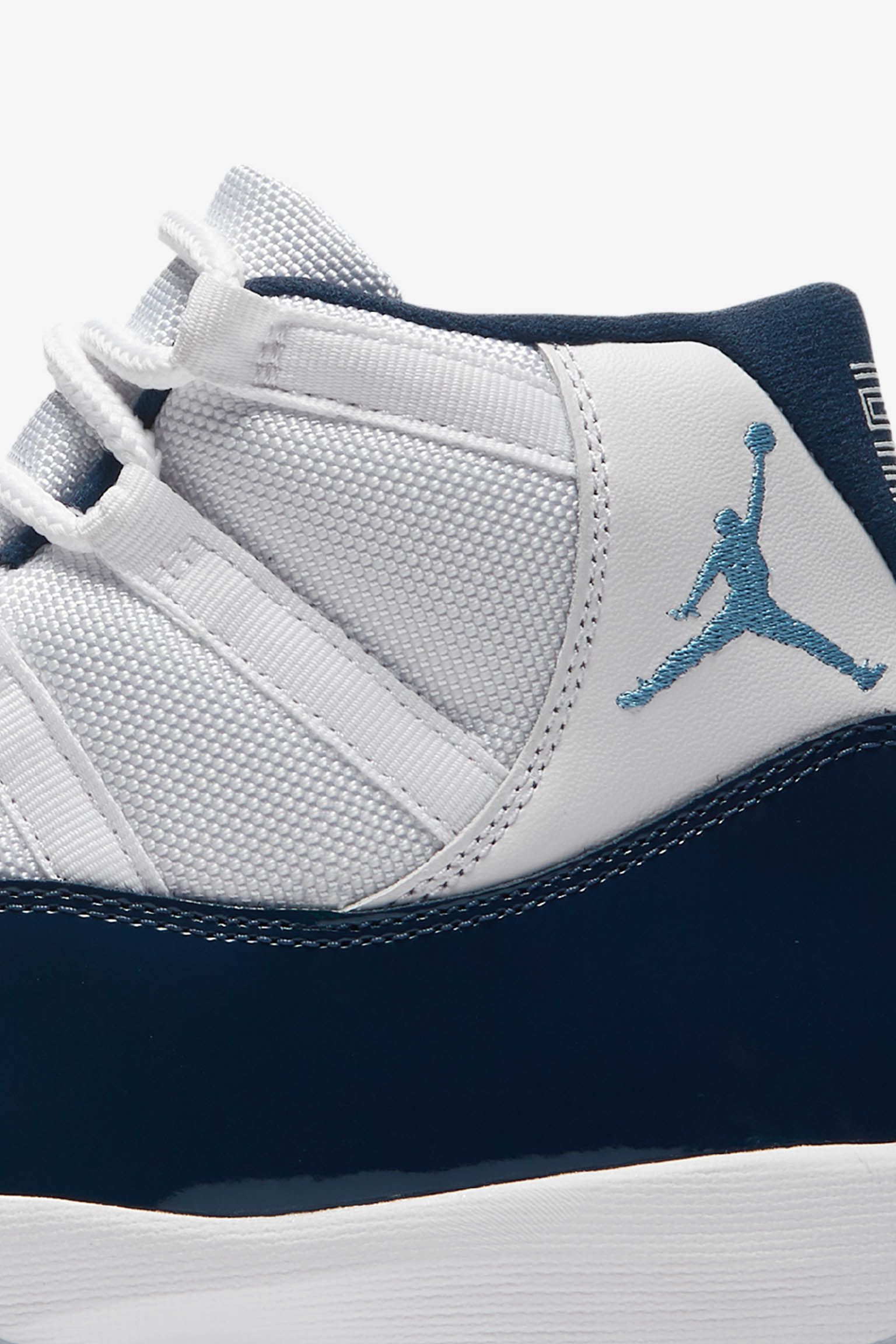 blue and white jordans 11 release date