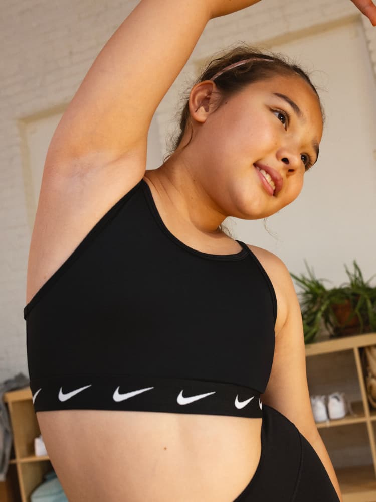 Girls Back to School Green Sports Bras. Nike UK
