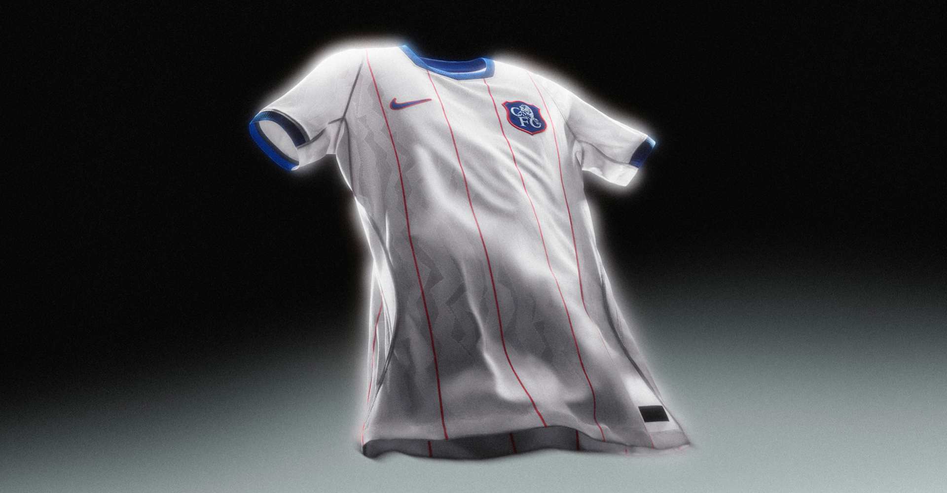 A football shirt floating in a dark studio space, a white football shirt with red pinstripes, blue collar and cuffs, and the Chelsea FC crest.
