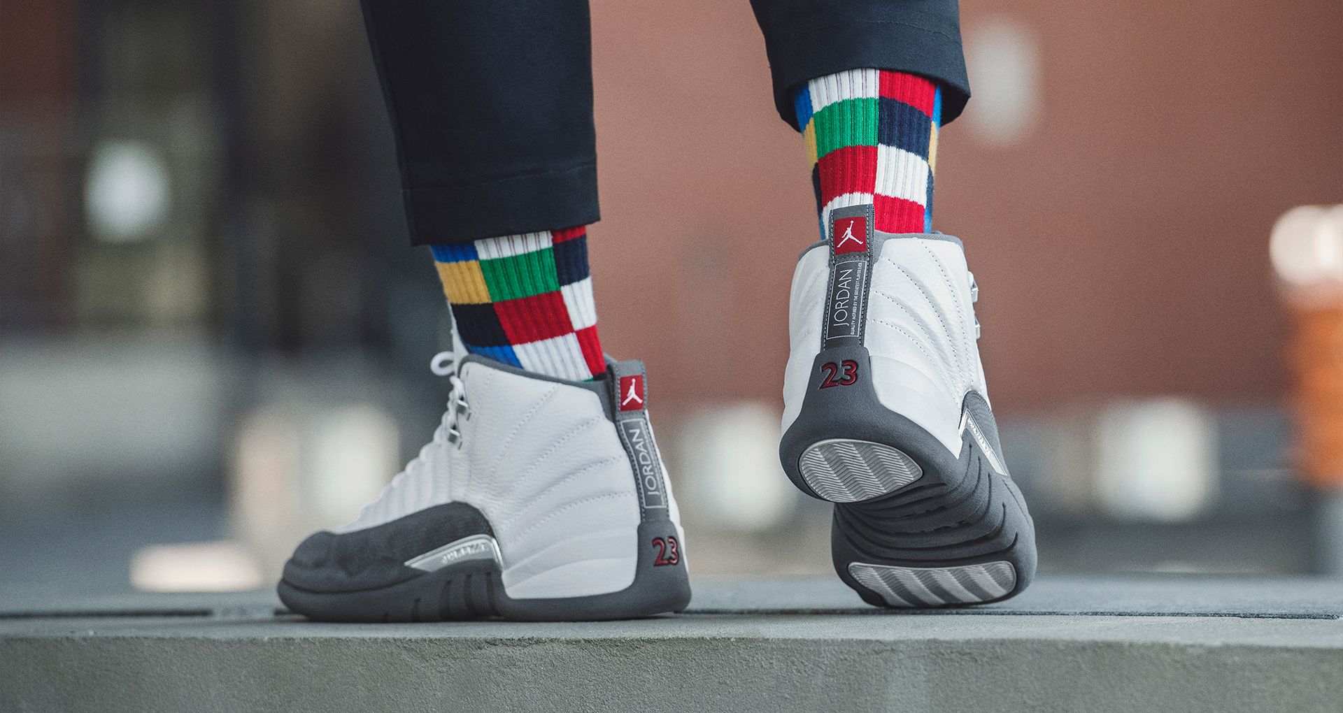 gray and white 12 jordans