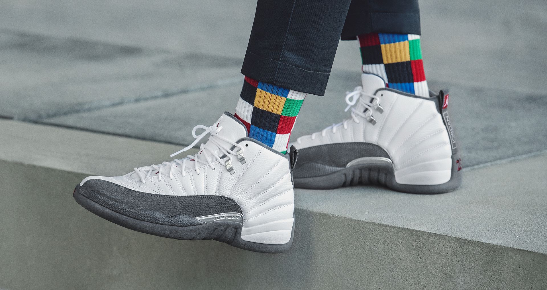 gray and white 12 jordans