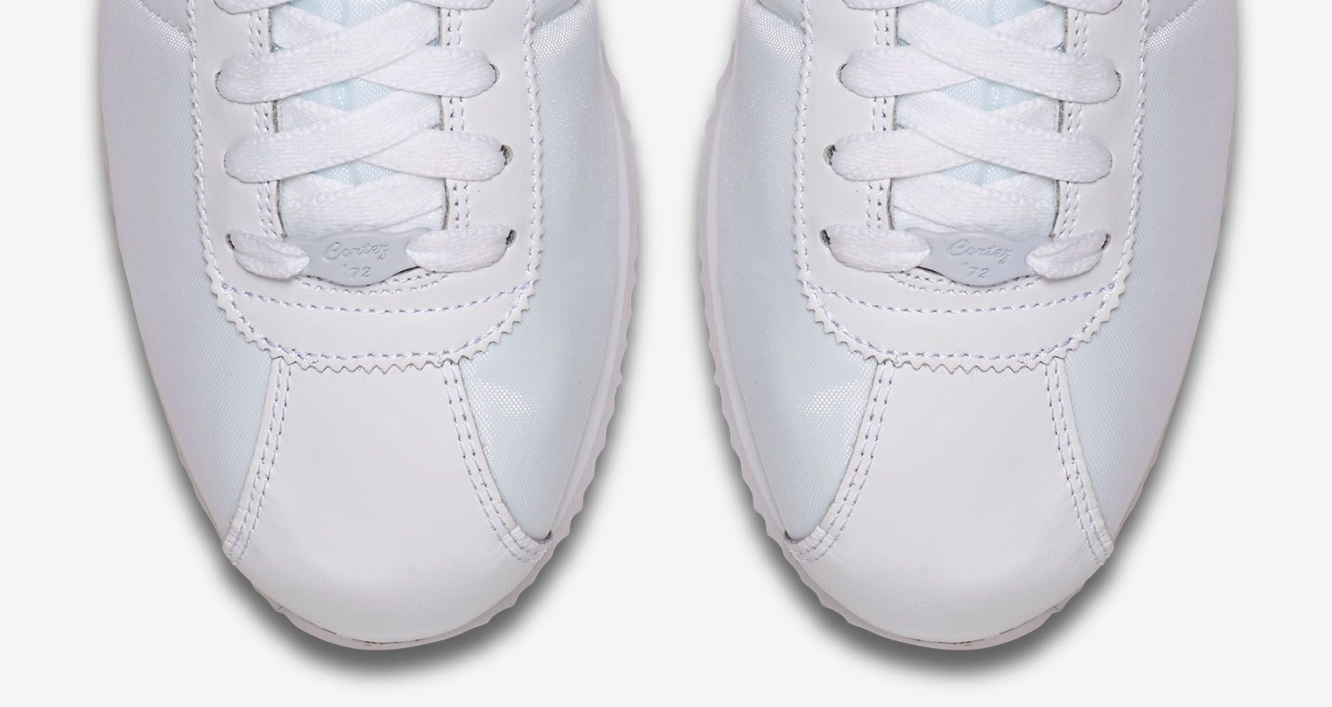 all white cortez shoes
