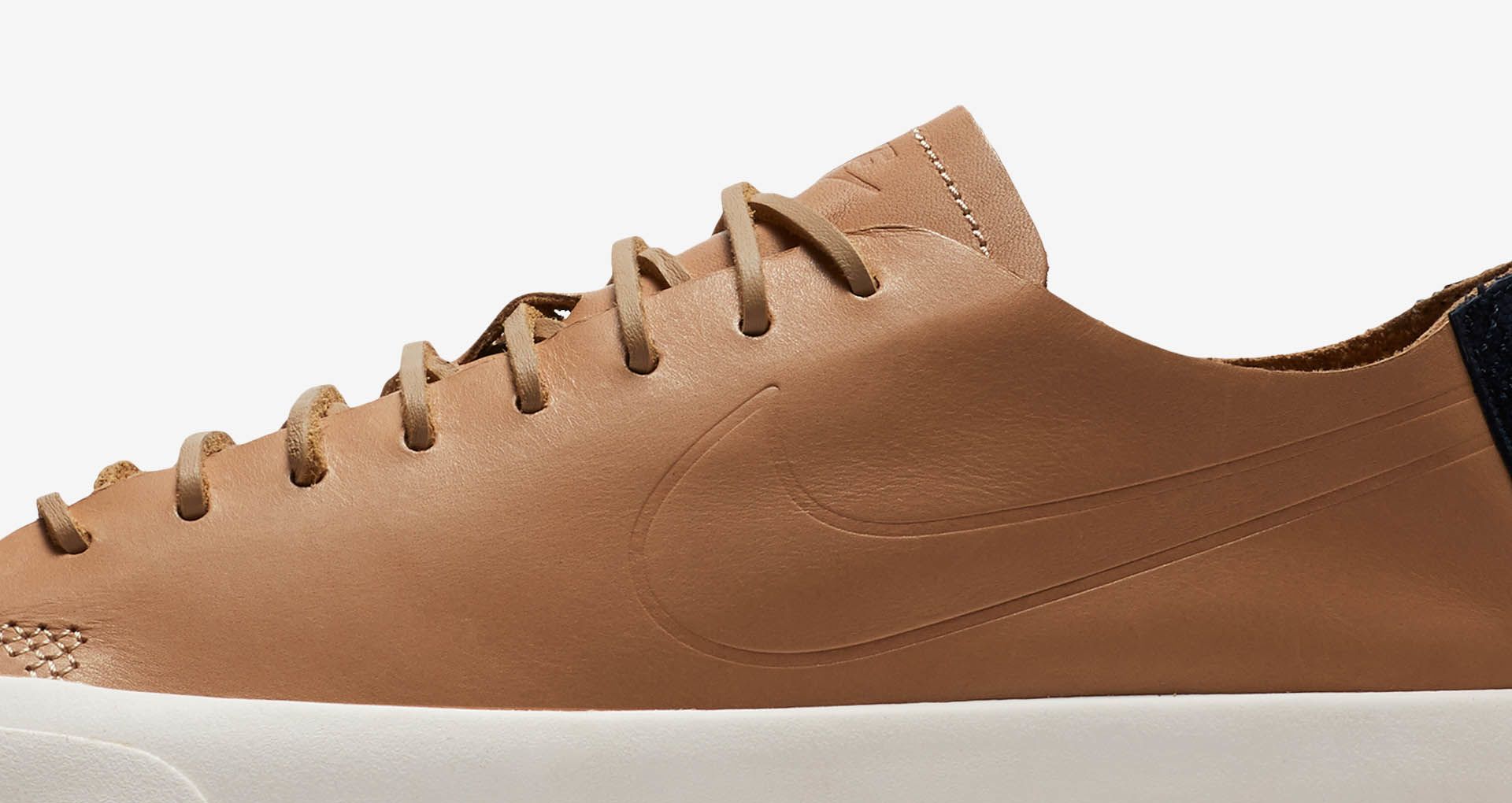 tan nike tech