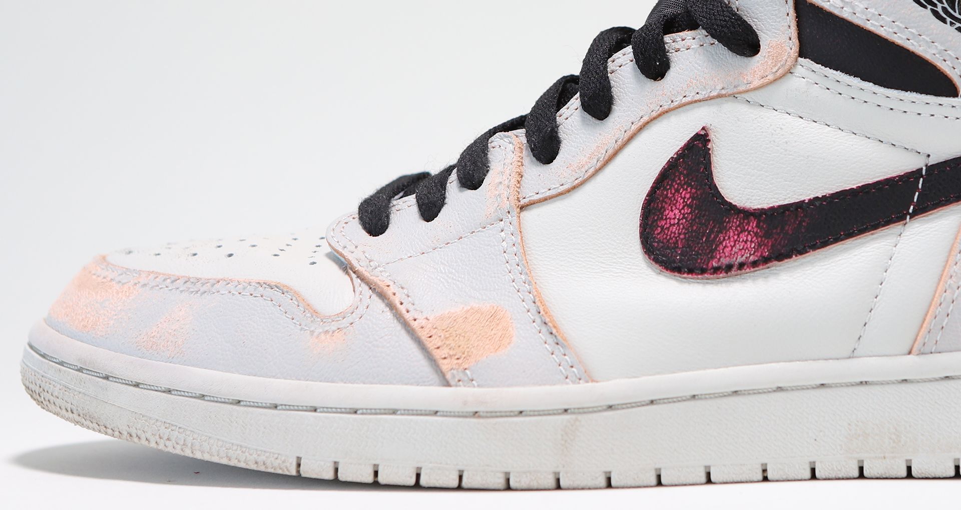 red black and white low top jordans