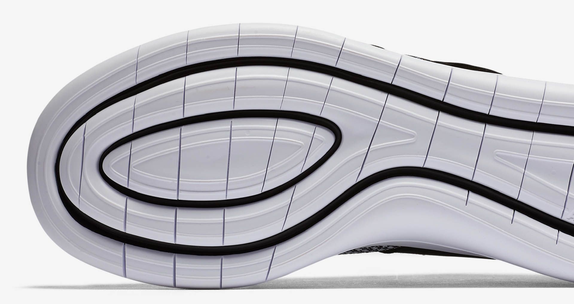 Women's Nike Air Sock Racer Ultra Flyknit 'Black & White'. Nike SNKRS