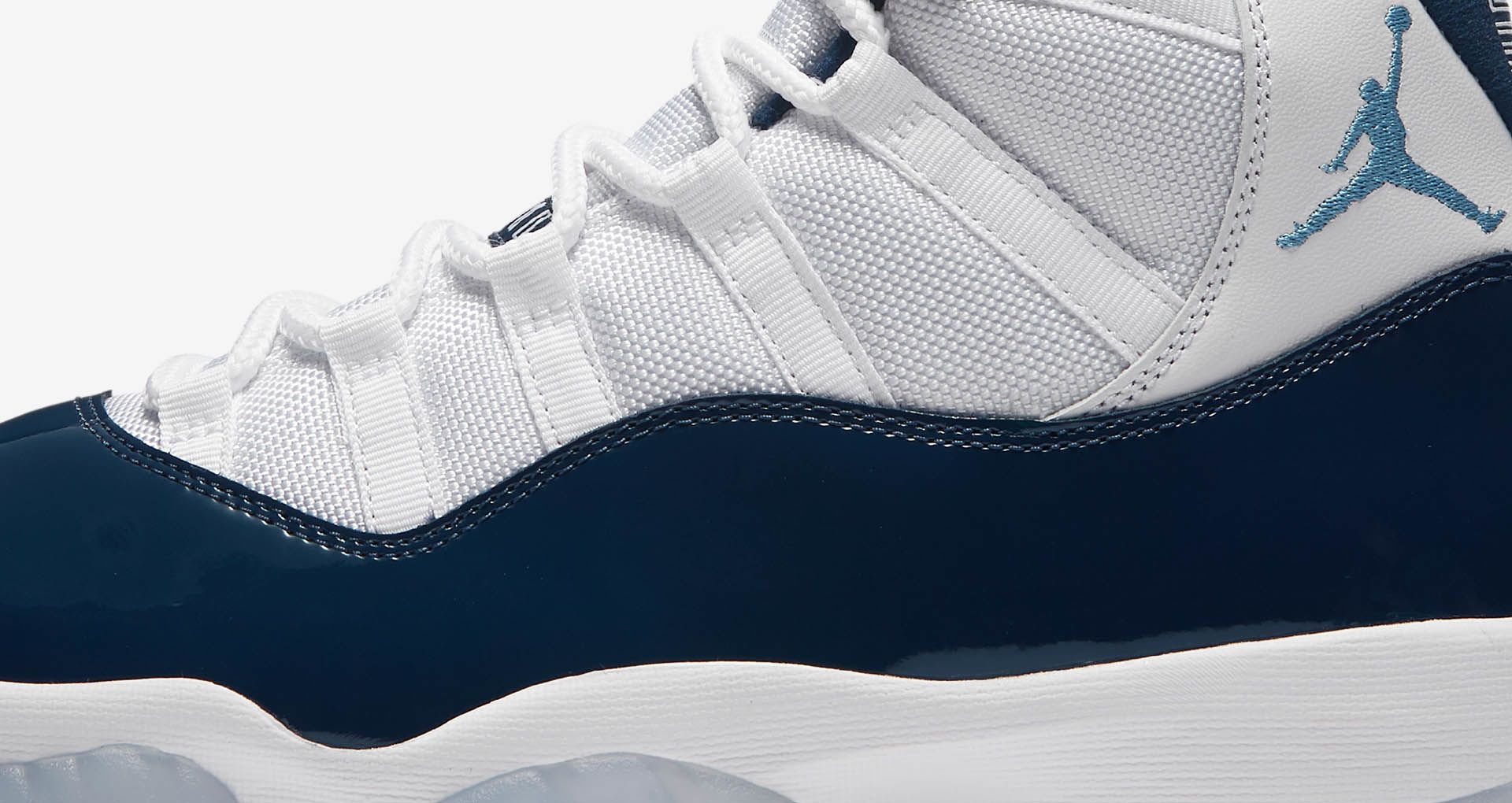 navy jordan 11
