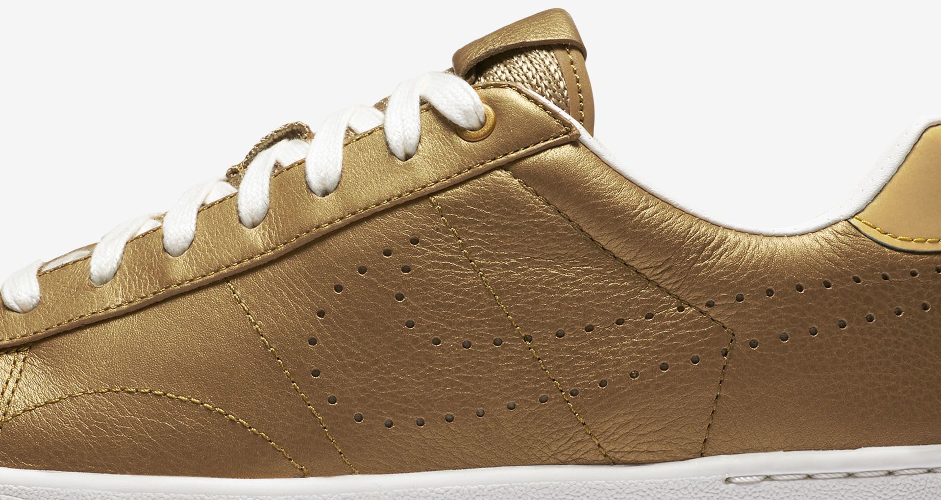 nike tennis shoes gold
