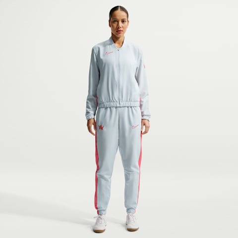 Женские комплекты Nike Academy "Alexia Putellas" Dri-FIT Soccer Woven Tracksuit, цвет: Платиновый / Морской коралловый