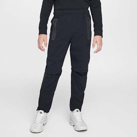 Брюки Nike Tech Woven для мальчиков, цвет: Чёрный