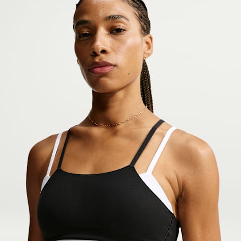 Женский спортивный бюстгальтер Nike Zenvy лёгкой поддержки со вставками, цвет: Чёрный / Белый