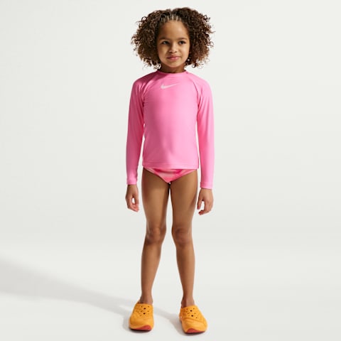 Детский купальный комплект Nike Swim для девочек: лонгслив Hydroguard и миди-бикини, цвет: Розовый сияющий / Розовый пенный